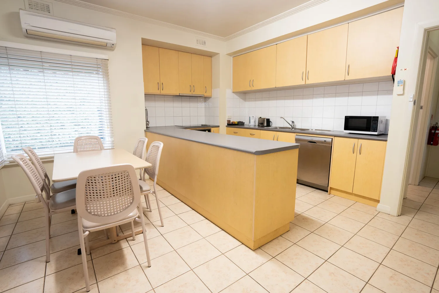 Kitchen and dining area in Residence on Main.