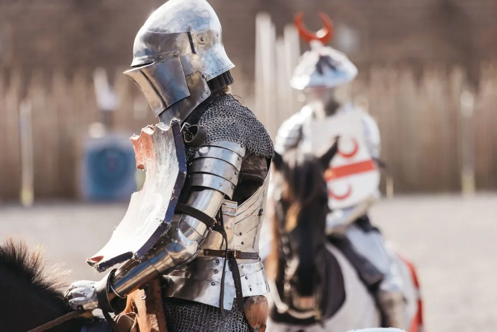Armoured knights on horseback at Kryal Castle.
